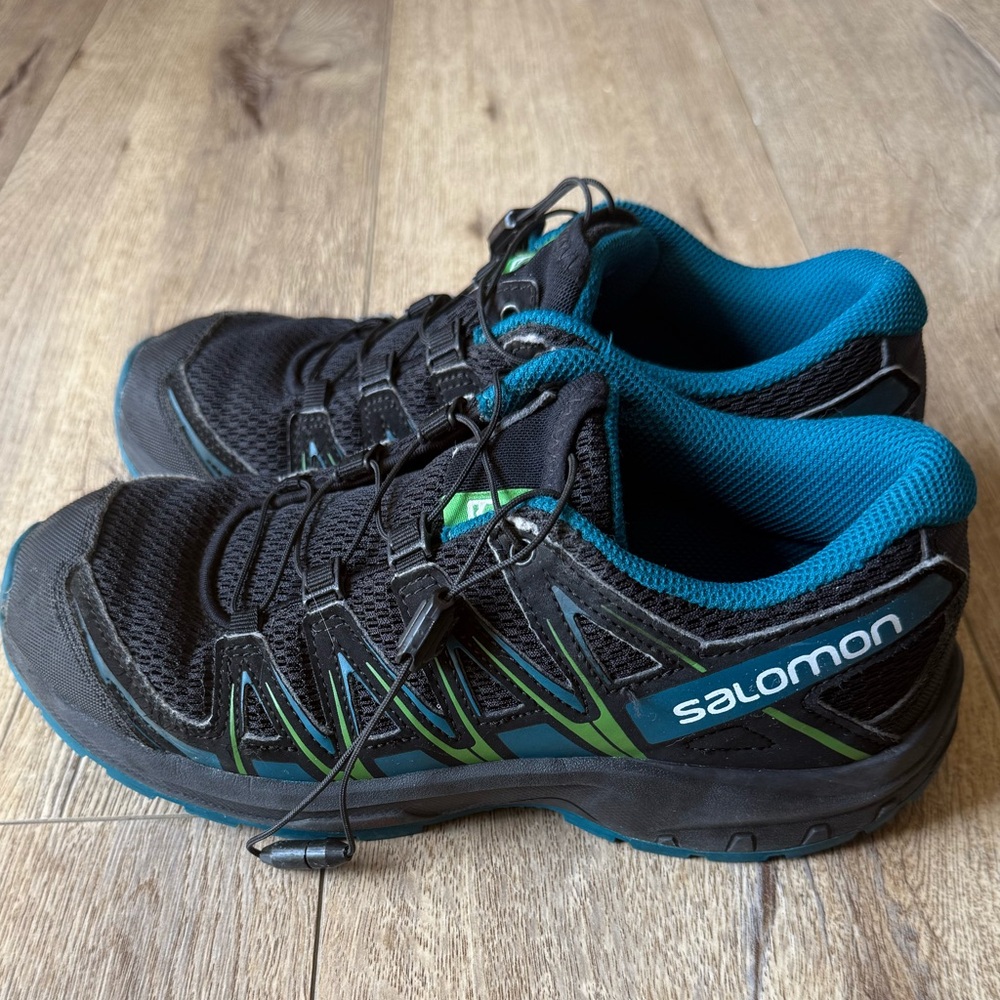 Salomon Black and Teal Trail Shoes